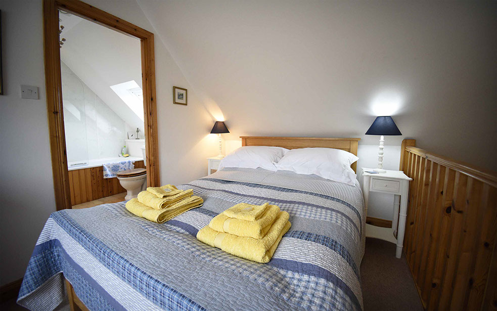 Our self catering accommodation in Glenhinnisdal contains a double bedroom with en suite bathroom 