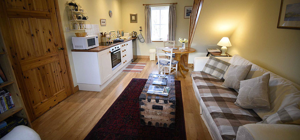 Our self catering accommodation contains a comfortable seat and kitchen